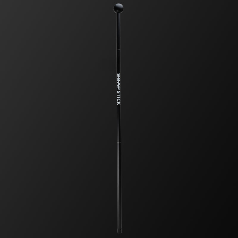 ScapStick V2 black background product shot - elite shoulder recovery tool for overhead sports athletes